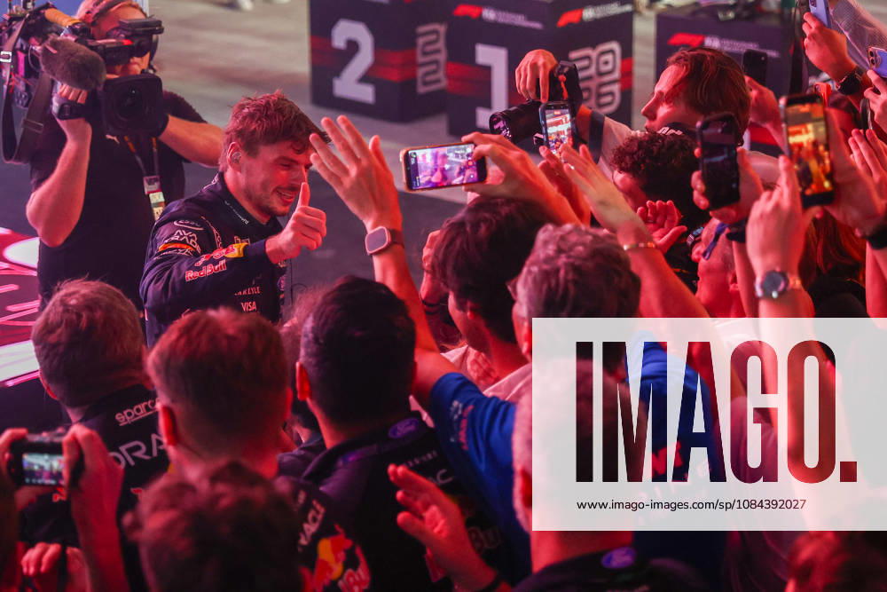 Max Verstappen wins 2026 Formula 1 Singapore Grand Prix SINGAPORE - OCT 11: Red Bull Racing driver Max Verstappen celebrates on the podium after winning the Formula 1 Singapore Grand Prix at the Marina Bay Street Circuit in Singapore on October 11, 2026. Daniel Ceng Anadolu Singapore Singapore. Editorial use only. Please get in touch for any other usage.