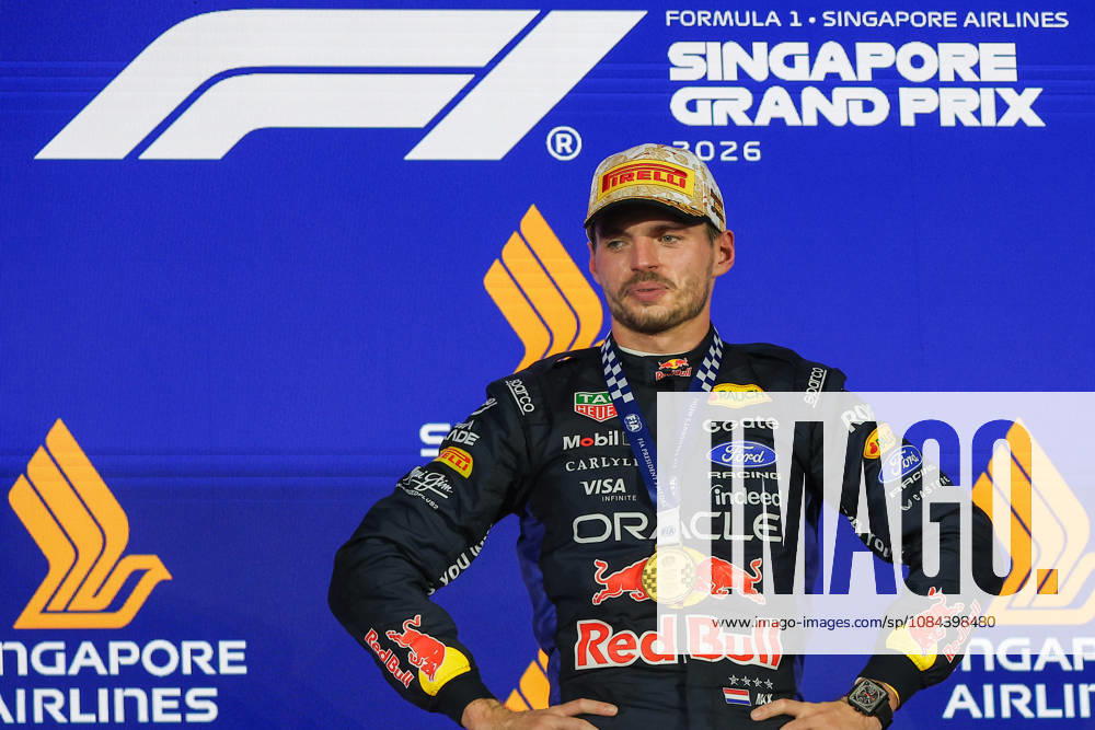 Max Verstappen wins 2026 Formula 1 Singapore Grand Prix SINGAPORE - OCT 11: Red Bull Racing driver Max Verstappen celebrates on the podium after winning the Formula 1 Singapore Grand Prix at the Marina Bay Street Circuit in Singapore on October 11, 2026. Daniel Ceng Anadolu Singapore Singapore. Editorial use only. Please get in touch for any other usage.