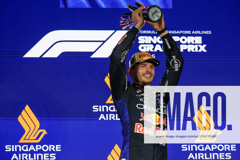 Max Verstappen wins 2026 Formula 1 Singapore Grand Prix SINGAPORE - OCT 11: Red Bull Racing driver Max Verstappen celebrates on the podium after winning the Formula 1 Singapore Grand Prix at the Marina Bay Street Circuit in Singapore on October 11, 2026. Daniel Ceng Anadolu Singapore Singapore. Editorial use only. Please get in touch for any other usage.