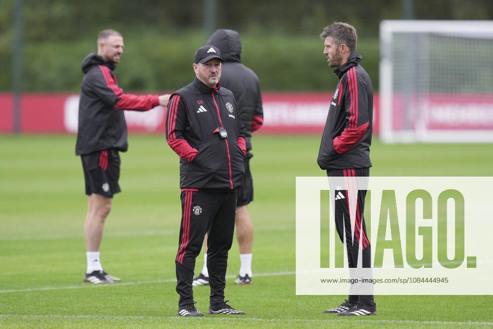 Manchester United, ManU Training, Champions League Manchester United assistant manager Steve Holland speaks with Manchester United manager Michael Carrick during the Manchester United Training Session at Carrington Training Centre, ahead of the UEFA Champions League Matchday 2 v Atletico Madrid, Manchester, England on 12 October 2026 Credit: Steve Flynn Every Second Media Editorial use only. All images are copyright Every Second Media Limited. No images may be reproduced without prior permission.
