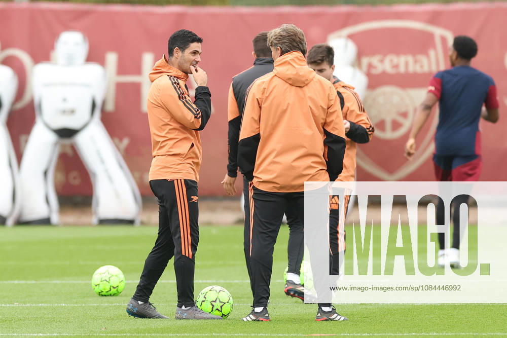 Arsenal Training & Media Conference, Champions League Arsenal Manager, Mikel Arteta speaks with his coaching staff during the Arsenal training session at the Arsenal FC Training Centre, ahead of UEFA Champions League Matchday 2 v Lille, London Colney, England on 12 October 2026 Credit: Tiego Grenho Every Second Media Editorial use only. All images are copyright Every Second Media Limited. No images may be reproduced without prior permission.