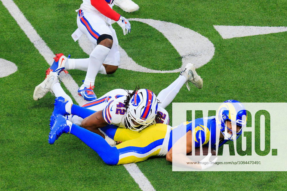 12 Puka Nacua, WR of the Los Angeles Rams is tackled by 42 Dorian Williams, LB of the Buffalo Bills during a regular NFL, American Football Herren, USA game against the Buffalo Bills on Monday October 12, 2026 at SoFi Stadium in Inglewood, California. Rams lose to Bills, 34-37 in overtime. JAVIER ROJAS PI Rams Vs. Bills - ZUMAp124 20261012_zaa_p124_045