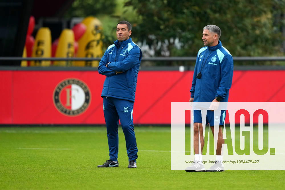 Training Champions League Feyenoord Rotterdam 2026 2027 Rotterdam - Coach Giovanni van Bronckhorst of Feyenoord Rotterdam and Assistant coach Said Bakkati of Feyenoord Rotterdam look on during a training before the Champions League match against Como 1907. The training is set at Trainingscomplex 1908 on 13 October 2026 in Rotterdam, Netherlands. (Hero Images Yannick Verhoeven)