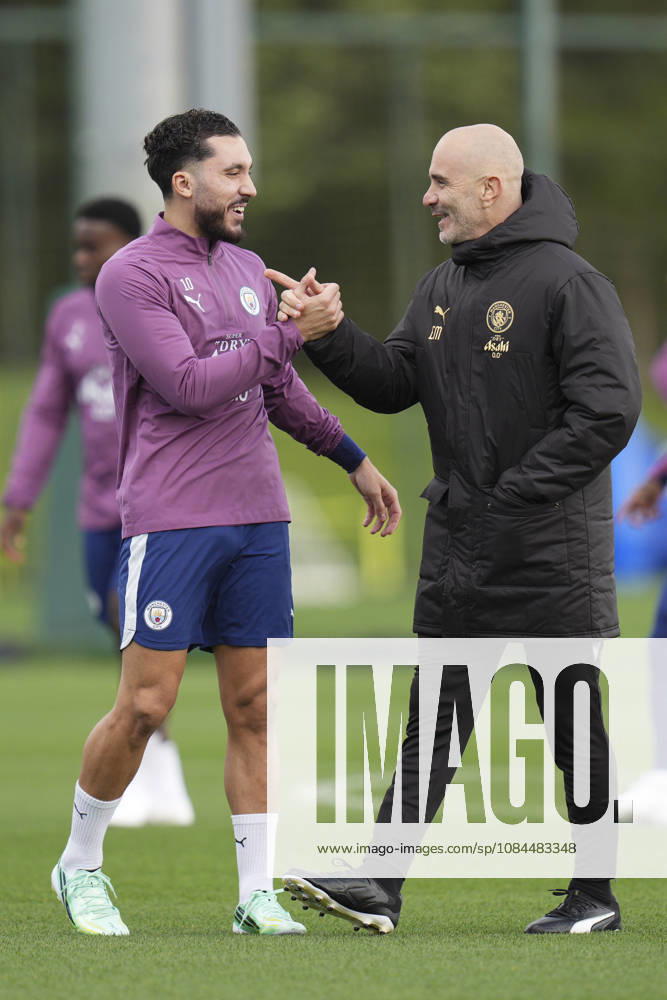 Manchester City Training, Champions League Manchester City manager Enzo Maresca greets Rayan Cherki of Manchester City during the training session ahead of UEFA Champions League matchday 2 vs Paris Saint-Germain, Manchester City at Joie Stadium, Etihad Campus, Manchester, England on 13 October 2026 Credit: Steve Flynn Every Second Media Editorial use only. All images are copyright Every Second Media Limited. No images may be reproduced without prior permission.