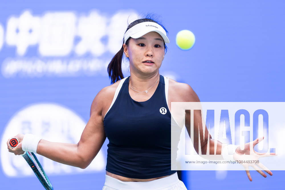 Hanyu Guo of China seen in action with Sorana Cirstea of Romania ( not in view) during the Wuhan Open final match at the Optics Valley International Tennis Center. Hanyu Guo defeated Sorana Cirstea with a score of 1-6, 7-6, 7-5. Wuhan China - ZUMAs197 20261013_aaa_s197_098