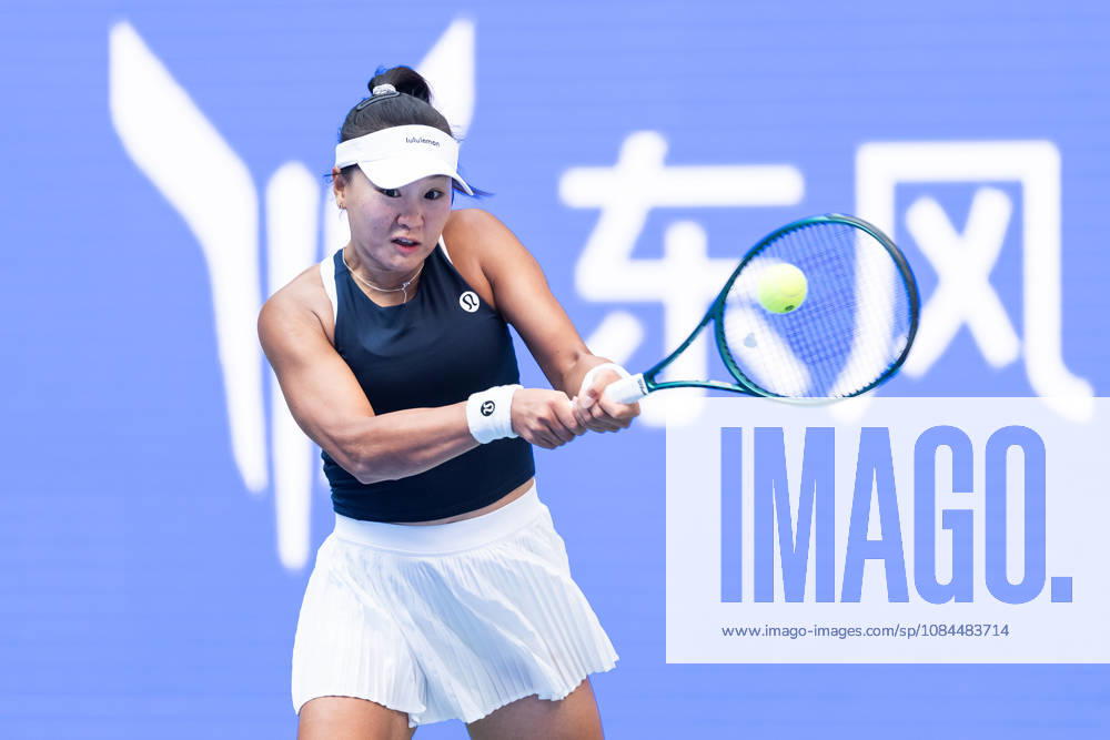 Hanyu Guo of China seen in action with Sorana Cirstea of Romania ( not in view) during the Wuhan Open final match at the Optics Valley International Tennis Center. Hanyu Guo defeated Sorana Cirstea with a score of 1-6, 7-6, 7-5. Wuhan China - ZUMAs197 20261013_aaa_s197_102