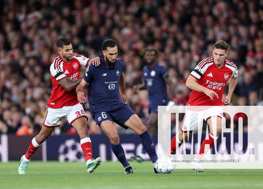 London, England, 13th October 2026. Bruno Guimaraes of Arsenal tackles Nabil Bentaleb of LOSC Lille during the Arsenal vs LOSC Lille UEFA Champions League match at the Emirates Stadium, London. Picture credit should read: David Klein Sportimage . SPI_024_DK_Arsenal_Lille SPI-5065-0025