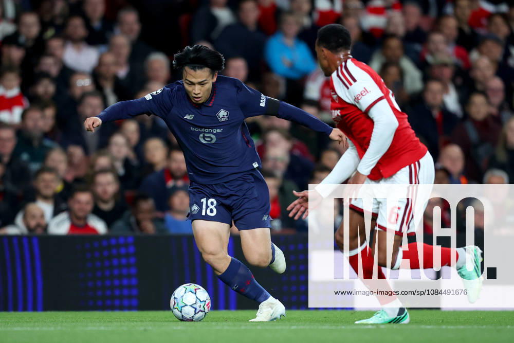 Arsenal FC v LOSC Lille - UEFA Champions League 2026 27 League Phase MD2 Ayase Ueda of LOSC Lille and Gabriel Magalhaes of Arsenal challenge during the UEFA Champions League 2026 27 League Phase MD2 match between Arsenal FC and LOSC Lille at Arsenal Stadium on October 13, 2026 in London, England. London Arsenal Stadium England United Kingdom