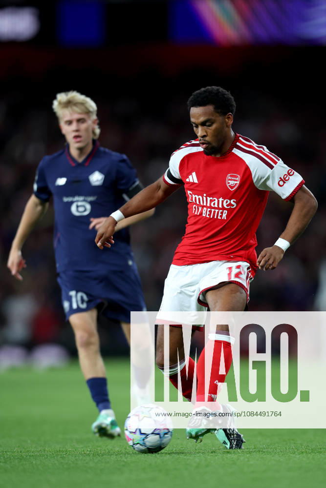 Arsenal FC v LOSC Lille - UEFA Champions League 2026 27 League Phase MD2 Hakon Arnar Haraldsson of LOSC Lille and Jurrien Timber of Arsenal challenge during the UEFA Champions League 2026 27 League Phase MD2 match between Arsenal FC and LOSC Lille at Arsenal Stadium on October 13, 2026 in London, England. London Arsenal Stadium England United Kingdom