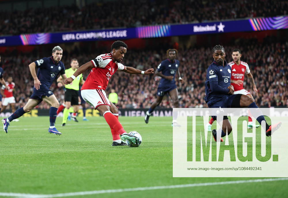 London, England, 13th October 2026. Jurrien Timber of Arsenal gets in a shot on goal as Alexsandro of LOSC Lille closes induring the Arsenal vs LOSC Lille UEFA Champions League match at the Emirates Stadium, London. Picture credit should read: David Klein Sportimage . SPI_028_DK_Arsenal_Lille SPI-5065-0029
