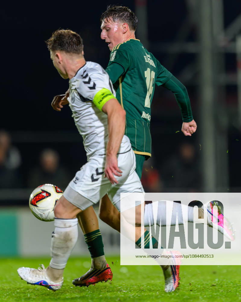 Fussball - Saison 2026 2027 - Regionalliga Bayern - 14. Spieltag: SC Eltersdorf - SV Wacker Burghausen - JoTe - - Jannis Turtschan (23, SV Wacker Burghausen ) Marco Niedermayer (16, SC Eltersdorf )