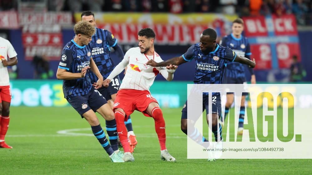 RB Leipzig - PSV Eindhoven Champions League Leipzig, 13.10.2026, Red Bull Arena, Fussball, UEFA Champions League , Gruppenphase, 2.Spieltag, RB Leipzig vs. PSV Eindhoven , Im Bild von links: Sven Mijnans ( 21, PSV), Romulo (40, RB Leipzig), Lutsharel Geertruida ( 2, PSV). , Nur zur redaktionellen Nutzung. Only editorial use. , UEFA regulations prohibit any use of photographs as image sequences and or quasi-video. ,