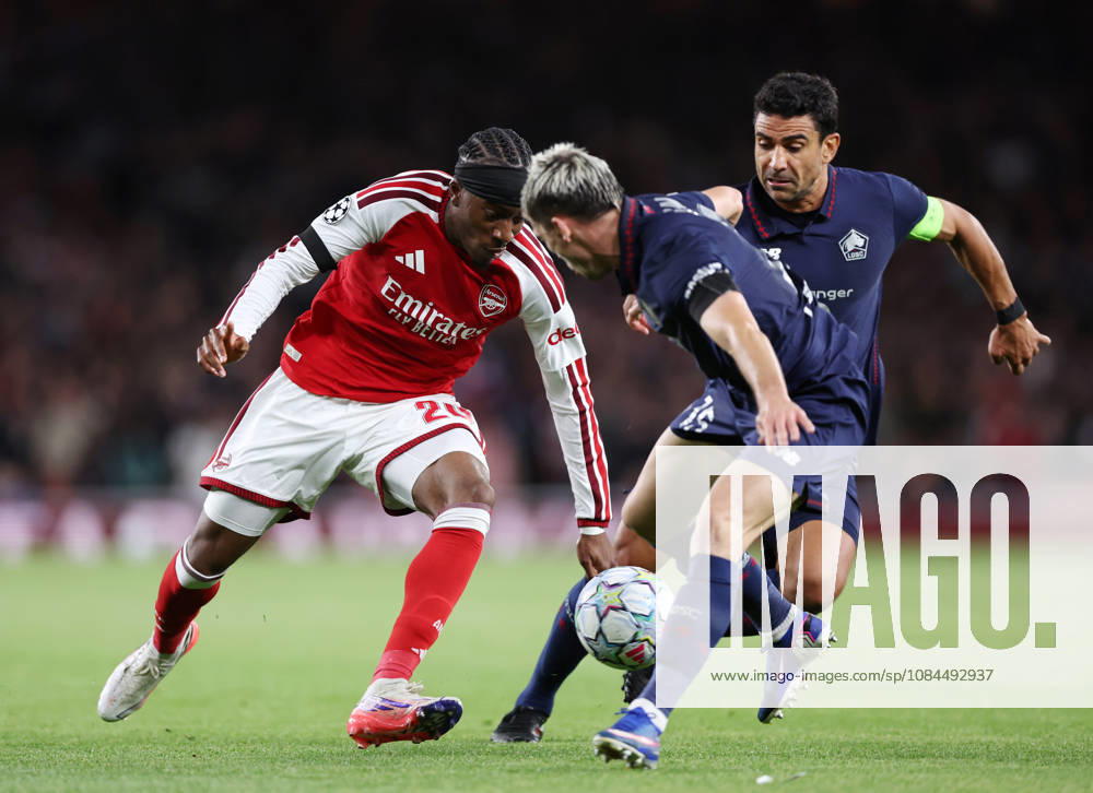London, England, 13th October 2026. Noni Madueke of Arsenal takes on Benjamin Andre of LOSC Lille (r)during the Arsenal vs LOSC Lille UEFA Champions League match at the Emirates Stadium, London. Picture credit should read: David Klein Sportimage . SPI_029_DK_Arsenal_Lille SPI-5065-0030
