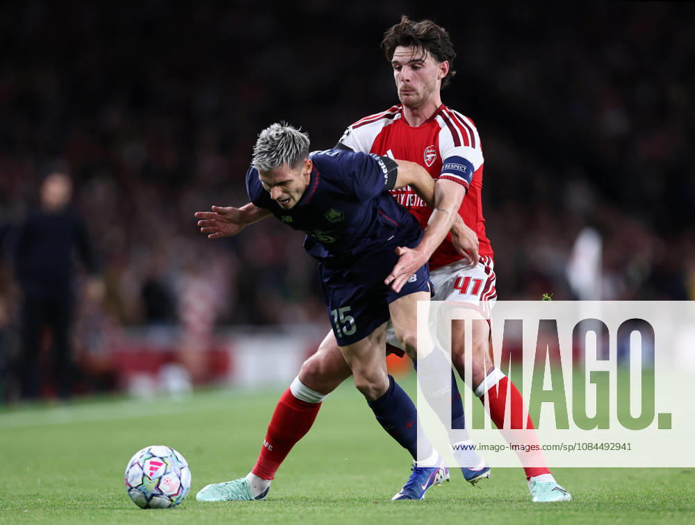 London, England, 13th October 2026. Romain Perraud of LOSC Lille tackled by Declan Rice of Arsenal during the Arsenal vs LOSC Lille UEFA Champions League match at the Emirates Stadium, London. Picture credit should read: David Klein Sportimage . SPI_030_DK_Arsenal_Lille SPI-5065-0031