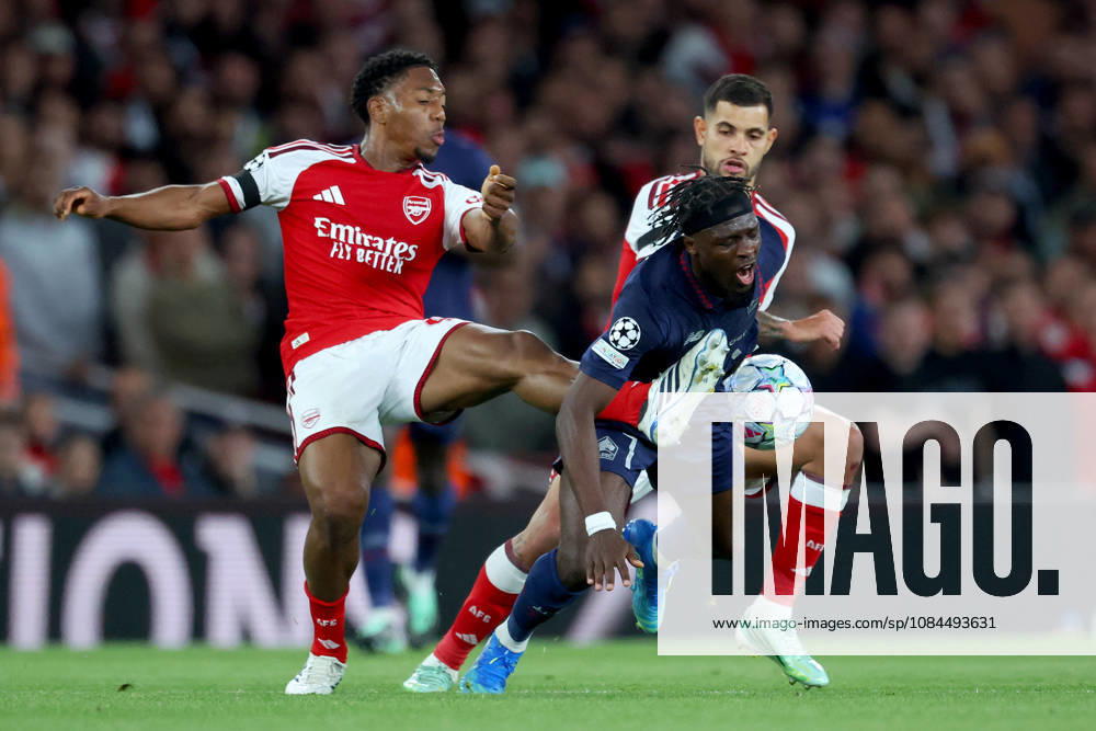 Arsenal FC v LOSC Lille - UEFA Champions League 2026 27 League Phase MD2 Myles Lewis-Skelly of Arsenal, Dilane Bakwa of LOSC Lille and Bruno Guimaraes of Arsenal challenge during the UEFA Champions League 2026 27 League Phase MD2 match between Arsenal FC and LOSC Lille at Arsenal Stadium on October 13, 2026 in London, England. London Arsenal Stadium England United Kingdom