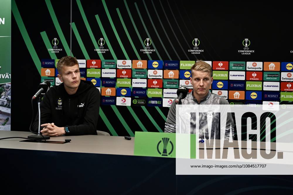 Ahead of the KuPS Kuopio v Trabzonspor - UEFA Conference League TAMPERE, FINLAND - OCTOBER 14: KuPS Kuopio head coach Miika Nuutinen (R) and player Petteri Pennanen (L) attend a pre-match press conference, PK, Pressekonferenz at Tammelan stadion in Tampere, Finland on October 14, 2026. With KuPS hosting their UEFA Conference League opening match against Trabzonspor away from Kuopio due to stadium criteria, the team held their official media briefing at the 8,000-capacity venue. Seyit Ahmet Eksik Anadolu Tampere Finland. Editorial use only. Please get in touch for any other usage.