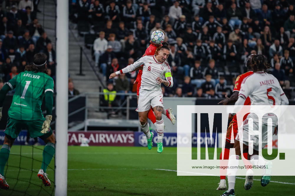 SOCCER - UEFA CL, LASK vs Liverpool LINZ,AUSTRIA,14.OCT.26 - SOCCER - UEFA Champions League, Linzer ASK vs Liverpool FC. Image shows Krystof Danek (LASK) and Kostas Tsimikas (Liverpool). GEPAxpictures xManuelxBinder