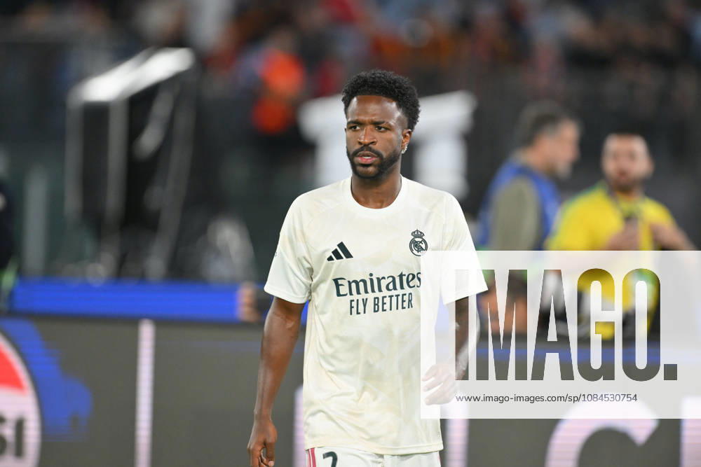 IPA89687902 - Vinicius Junior of Real Madrid during the pre-match warm-up for the UEFA Champions League soccer match between Roma and Real Madrid at the Stadio Olimpico on October 14, 2026, in Rome, Lazio. During the AS Roma vs. Real Madrid UEFA Champions League soccer match in Rome, Italy, on October 14, 2026