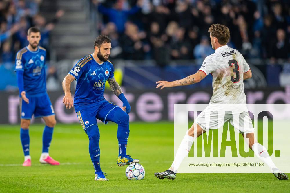 Tigran Barseghyan in a battle with Ramon Hendriks during UEFA Champions league match , SK Slovan Bratislava - VFB Stuttgart , 14. october 2026, Tehelne pole Stadium, Bratislava, Slovakia