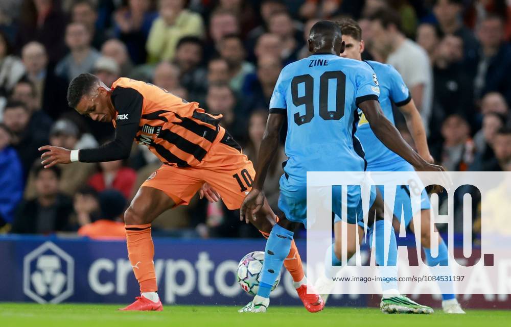Pedrinho of Shakhtar Donetsk in action against Antonio Zini (centre) and Razvan Marin of AEK Athens Shakhtar Donetsk v AEK, UEFA Champions League, Football, Stamford Bridge, London, UK - 14 Oct 2026London Stamford Bridge United Kingdom
