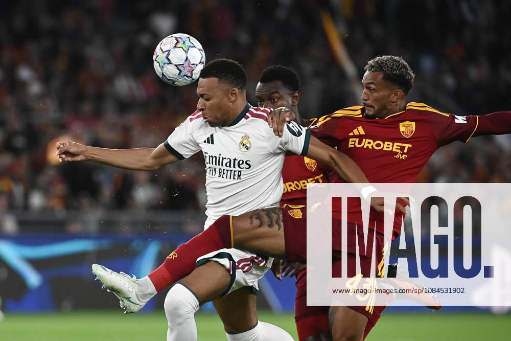 AS Roma v Real Madrid - UEFA Champions League ROME, ITALY, OCTOBER 14: Real Madrid s Kylian Mbappe (L) fight for the ball with Roma s Wesley during the League phase of the UEFA Champions League football match between Roma and Real Madrid at the Olympic Stadium in Rome, Italy, on October 14, 2026. Isabella Bonotto Anadolu Rome Italy. Editorial use only. Please get in touch for any other usage.