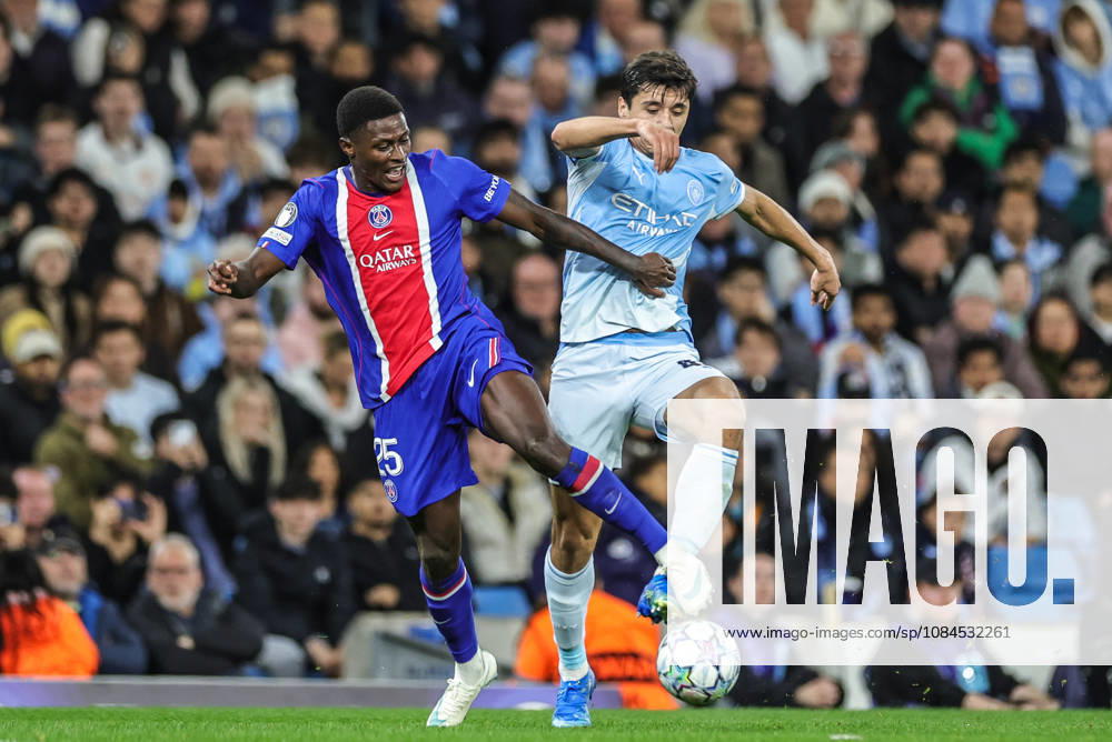 UEFA Champions League Matchday 2 of 8 Manchester City v Paris Saint-Germain Nuno Mendes of Paris Saint-Germain and Abdukodir Khusanov of Manchester City battle for the ball during the UEFA Champions League Matchday 2 of 8 match Manchester City vs Paris Saint-Germain at City of Manchester Stadium, Manchester, United Kingdom on 14 October 2026 (Photo by Mark Cosgrove News Images) Manchester City of Manchester Stadium Greater Manchester United, ManU Kingdom