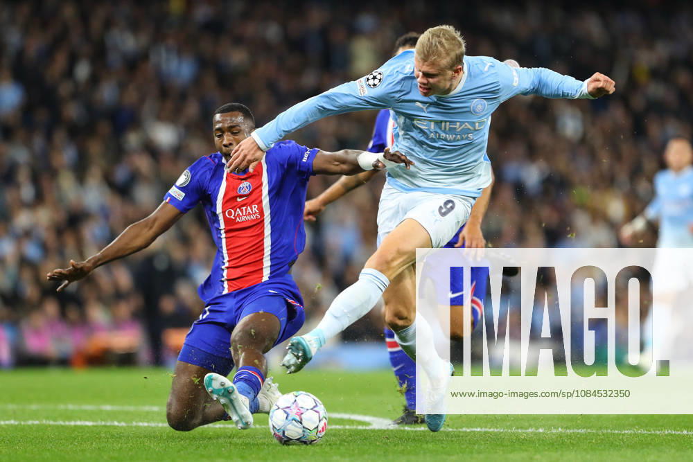 Manchester City v Paris Saint Germain - UEFA Champions League MANCHESTER, ENGLAND, OCTOBER 14: Willian Pacho of Paris Saint-Germain (L) tackles Erling Haaland of Manchester City (R) during the UEFA Champions League football match between Manchester City and Paris Saint Germain at the Etihad Stadium in Manchester, England. (Photo by Zach Forster PS Newz) ManchesterUnited Kingdom