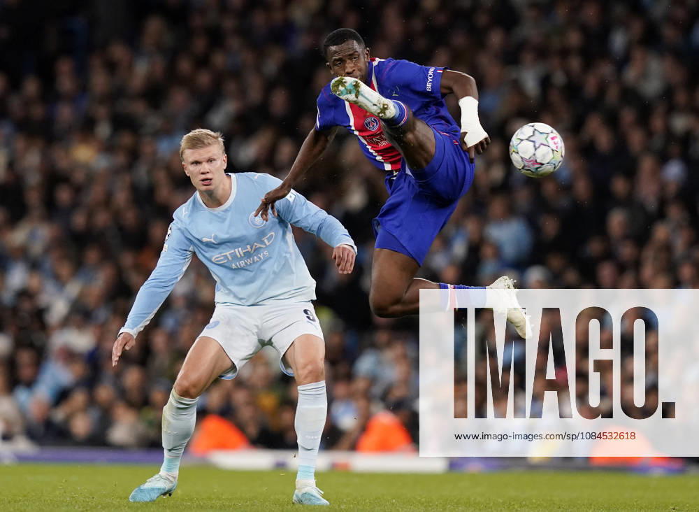 Manchester, England, 14th October 2026. Erling Haaland of Manchester City intercepted by William Pacho of Paris St Germain during the Manchester City vs Paris Saint Germain UEFA Champions League match at the Etihad Stadium, Manchester. Picture credit should read: Andrew Yates Sportimage . SPI_037_AY_Man_City_PSG SPI-5069-0037