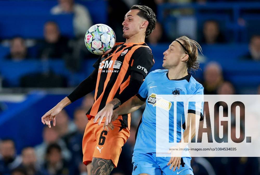 Lovro Majer of AEK Athens in action against Marlon Gomes of Shakhtar Donetsk Shakhtar Donetsk v AEK, UEFA Champions League, Football, Stamford Bridge, London, UK - 14 Oct 2026London Stamford Bridge United Kingdom
