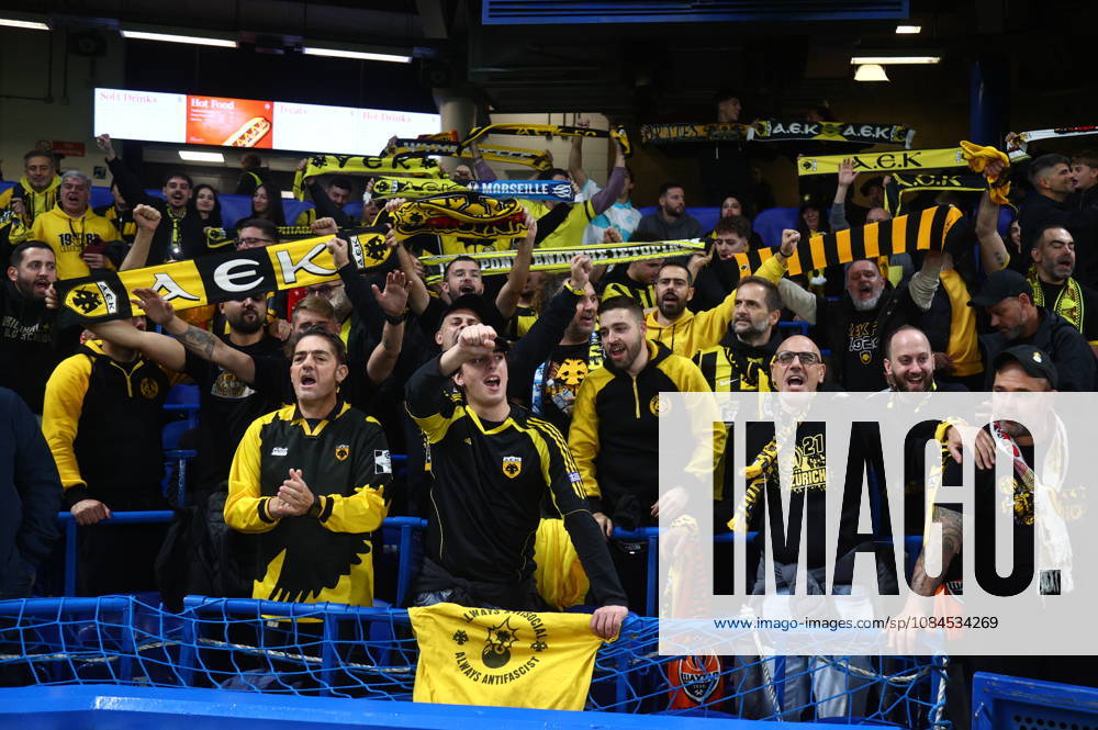 UEFA Champions League - Shakhtar Donetsk vs AEK Athens FC - Fans of AEK Athens FC react during the UEFA Champions League phase Matchday 2 soccer match between Shakhtar Donetsk vs AEK Athens FC in Stamford Bridge, London, UK, on 13 October 2026. IMAGO ONE INCH PRODUCTIONS LONDON UK