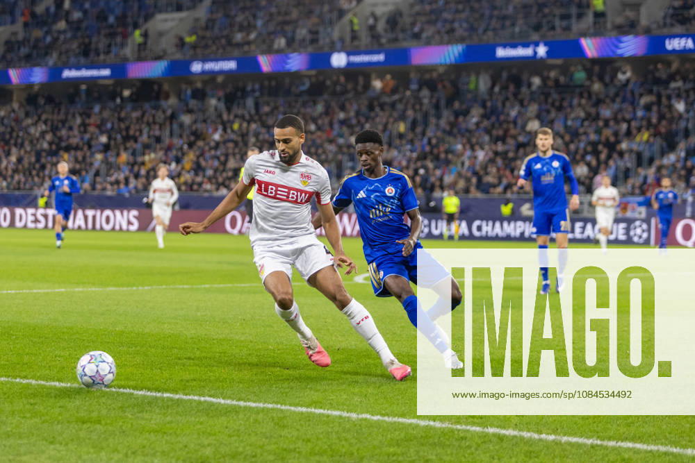 Josha Vagnoman of VfB Stuttgart and Suleiman Camara of SK Slovan Bratislava seen during UEFA Champions league League phase game between teams of SK Slovan Bratislava and VfB Stuttgart (Dominika Kortvelyesiova Ball Raw Images) Bratislava Tehelne Pole stadium Slovakia