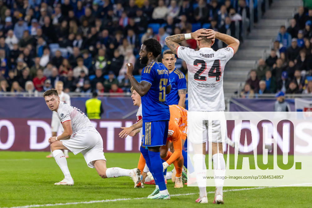 Sandro Cruz of SK Slovan Bratislava and Jeff Chabot of VfB Stuttgart seen during UEFA Champions league League phase game between teams of SK Slovan Bratislava and VfB Stuttgart (Dominika Kortvelyesiova Ball Raw Images) Bratislava Tehelne Pole stadium Slovakia