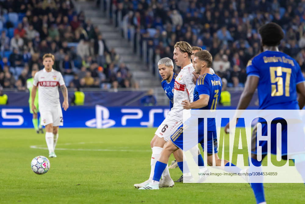 Cristian Martinez of SK Slovan Bratislava, Angelo Stiller of VfB Stuttgart and Peter Pokorny of SK Slovan Bratislava seen during UEFA Champions league League phase game between teams of SK Slovan Bratislava and VfB Stuttgart (Dominika Kortvelyesiova Ball Raw Images) Bratislava Tehelne Pole stadium Slovakia