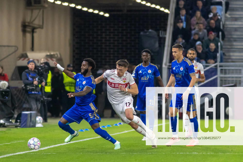 Rahim Ibrahim of SK Slovan Bratislava and DÅ¾enan PejÄinovic of VfB Stuttgart seen during UEFA Champions league League phase game between teams of SK Slovan Bratislava and VfB Stuttgart (Dominika Kortvelyesiova Ball Raw Images) Bratislava Tehelne Pole stadium Slovakia