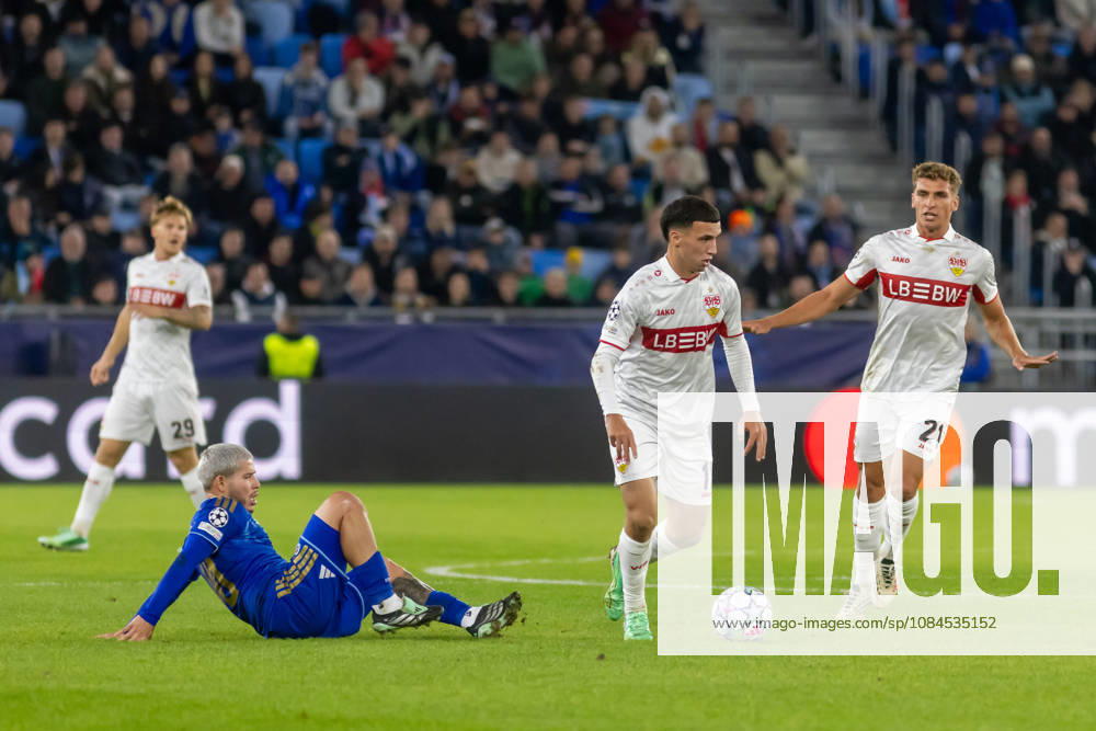 Cristian Martinez of SK Slovan Bratislava and Dženan PejÄinovic of VfB Stuttgart seen during UEFA Champions league League phase game between teams of SK Slovan Bratislava and VfB Stuttgart (Dominika Kortvelyesiova Ball Raw Images) Bratislava Tehelne Pole stadium Slovakia