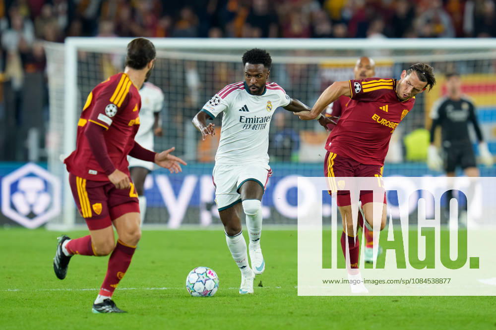 AS Roma v Real Madrid C.F. - UEFA Champions League 2026 27 League Phase MD2 Vinicius Junior of Real Madrid CF and Marten de Roon of AS Roma compete for the ball during the AS Roma v Real Madrid C.F. - UEFA Champions League 2026 27 League Phase MD2 at Stadio Olimpico on October 14, 2026 in Rome, Italy Rome Stadio Olimpico Lazio Italy