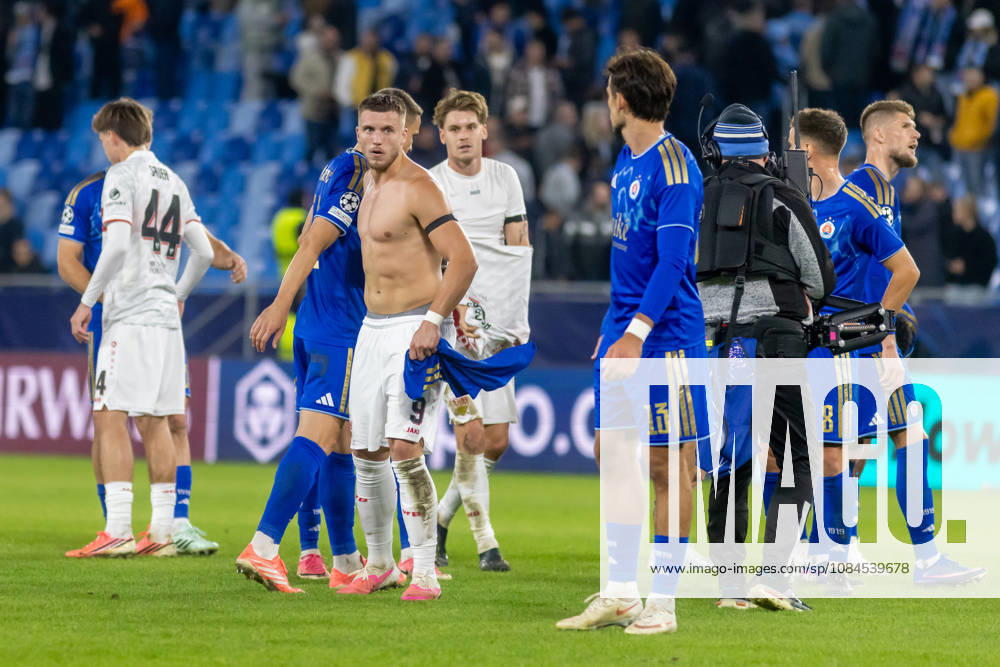 Roman Cerepkai of SK Slovan Bratislava and Ermedin Demirovic of VfB Stuttgart seen during UEFA Champions league League phase game between teams of SK Slovan Bratislava and VfB Stuttgart (Dominika Kortvelyesiova Ball Raw Images) Bratislava Tehelne Pole stadium Slovakia