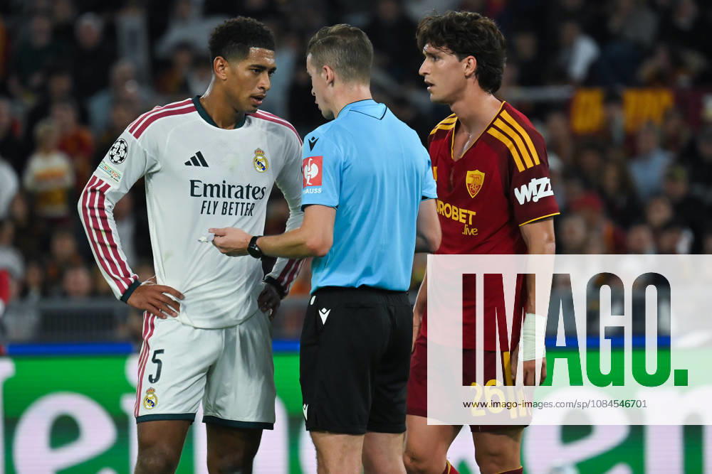2026,Roma-Real Madrid Jude Bellingham of Real Madrid,Referee Daniel Siebert,Leonardo Balerdi of Roma during the Champions League match Championship phase Matchday 2 Roma-Real Madrid at the Stadio Olimpico. Rome (Italy), October 14, 2026Imago-Images Emmefoto