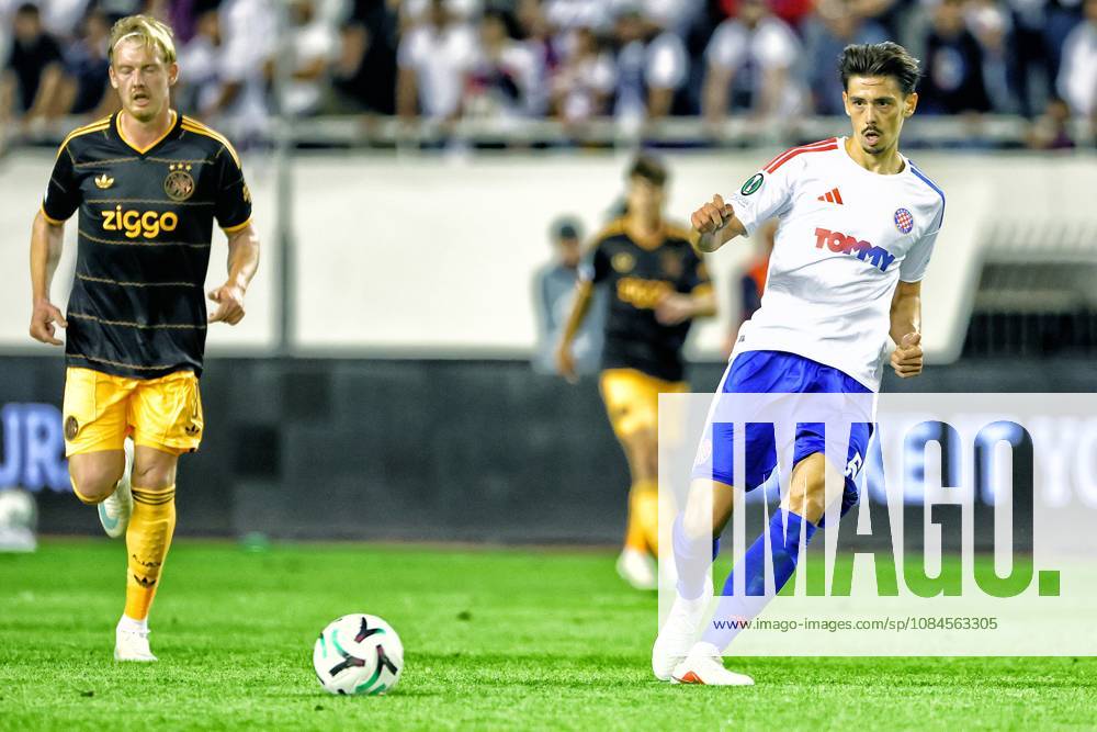 SPLIT, 15 10-2026, Poljud Stadium , season 2026 2027 , UEFA Conference League Football . Match between Hajduk Split and Ajax. Picture shows Ajax Julian Brandt and Hajduk Split Dennis Hadzikadunic Hajduk Split - Ajax x208448957x