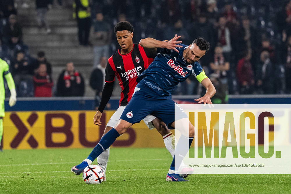 SOCCER - UEFA EL, RBS vs Milan SALZBURG,AUSTRIA,15.OCT.26 - SOCCER - UEFA Europa League, Red Bull Salzburg vs AC Milan. Image shows Haris Tabakovic (RBS) and Koni De Winter (Milan). GEPAxpictures Arellano