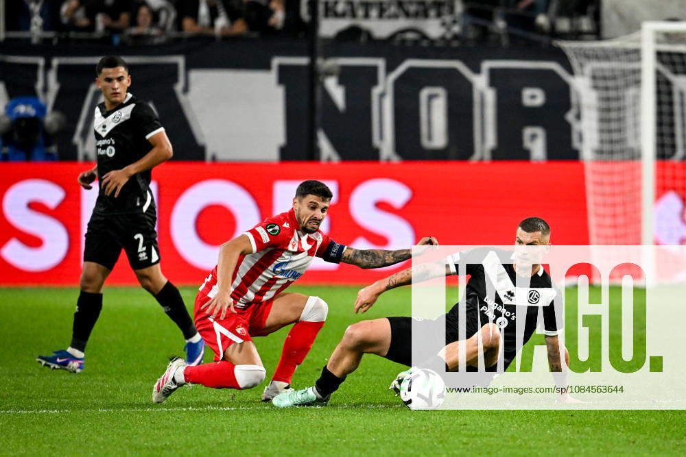 Rade Krunic of FK Crvena Zvezda and Lars Lukas Mai of FC Lugano battle for the ball during the UEFA Conference League 2026 27 League Phase MD1 match between FC Lugano and FK Crvena Zvezda at Lugano Arena on October 15, 2026 in Lugano, Switzerland. Lugano Lugano Arena Ticino Switzerland