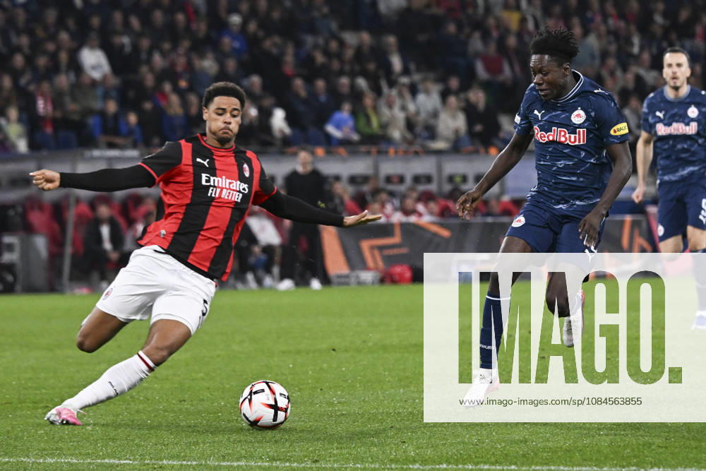 Koni De Winter of AC Milan and Edmund Baidoo of Salzburg compete for the ball during the UEFA Europa League league phase matchday 2 match between FC Salzburg and AC Milan at Red Bull Arena on October 15, 2026 in Salzburg, Austria.