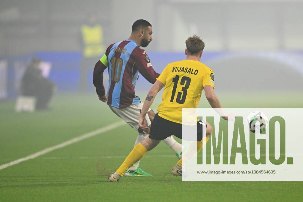 KuPS Kuopio v Trabzonspor - UEFA Conference League TAMPERE, FINLAND - OCTOBER 15: Muhammed Salah (10) of Trabzonspor in action against Niilo Kujasalo (13) of KuPS Kuopio during the UEFA Conference League Week 1 match between KuPS Kuopio and Trabzonspor at Tammelan Stadium in Tampere, Finland on October 15, 2026. Hasan Tascan Anadolu Tampere Finland. Editorial use only. Please get in touch for any other usage.