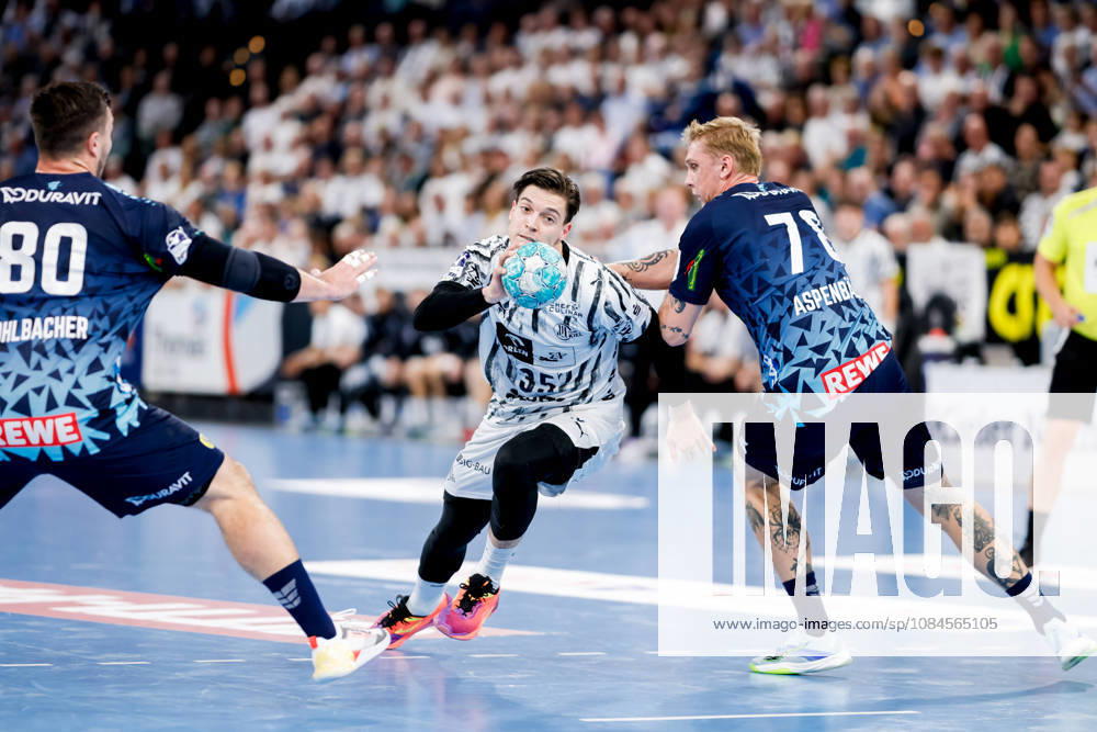 - Handball, 1. Bundesliga 2026 27, THW Kiel - Rhein-Neckar Löwen: Jannik Kohlbacher (Rhein-Neckar Löwen, 80), Domen Makuc (THW Kiel, 35)m, Edwin Aspenbäck (Rhein-Neckar Löwen, 78)