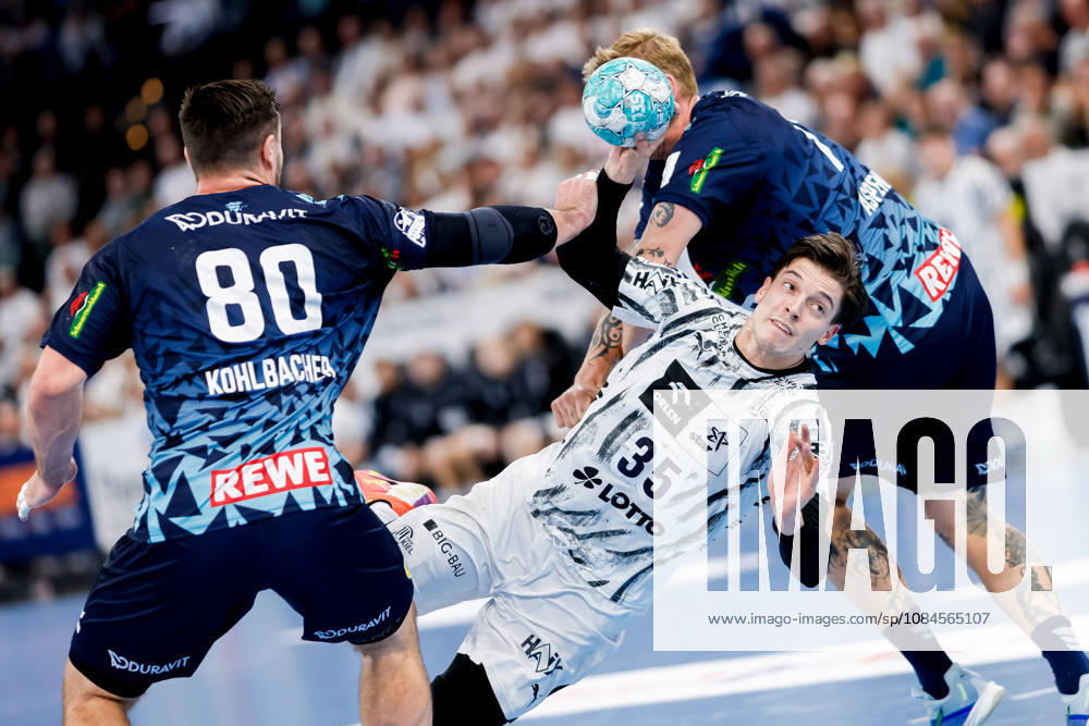 - Handball, 1. Bundesliga 2026 27, THW Kiel - Rhein-Neckar Löwen: Jannik Kohlbacher (Rhein-Neckar Löwen, 80), Domen Makuc (THW Kiel, 35)m, Edwin Aspenbäck (Rhein-Neckar Löwen, 78)