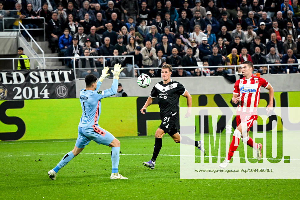 Kevin Behrens of FC Lugano tries to score against goalkeeper Matheus Magalhaes of FK Crvena Zvezda during the UEFA Conference League 2026 27 League Phase MD1 match between FC Lugano and FK Crvena Zvezda at Lugano Arena on October 15, 2026 in Lugano, Switzerland. Lugano Lugano Arena Ticino Switzerland