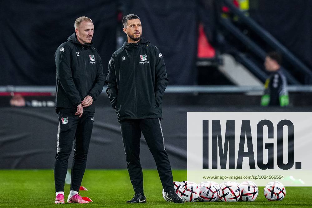 , Stadium De Goffert , season 2026 2027 , UEFA Europa League football , match between NEC Nijmegen and Levski Sofia , picture shows NEC Nijmegen assistent trainer coach Nick van der Velden and NEC Nijmegen assistent trainer coach Haris Medunjanin NEC - Levski Sofia x208451428x