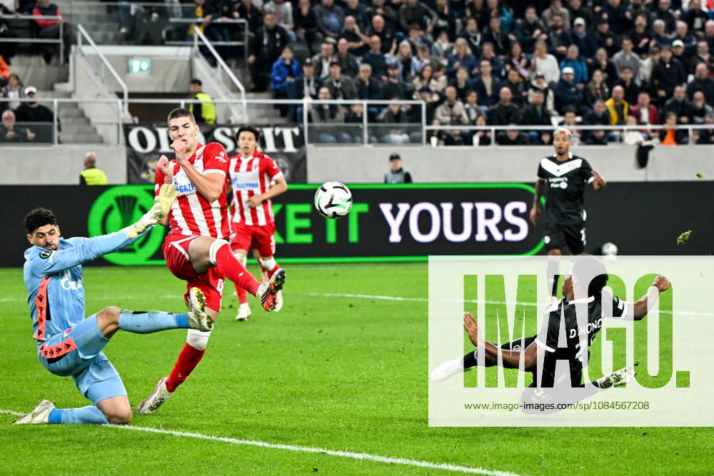 Dereck Moncada of FC Lugano R) scores a goal against goalkeeper Matheus Magalhaes of FK Crvena Zvezda during the UEFA Conference League 2026 27 League Phase MD1 match between FC Lugano and FK Crvena Zvezda at Lugano Arena on October 15, 2026 in Lugano, Switzerland. Lugano Lugano Arena Ticino Switzerland