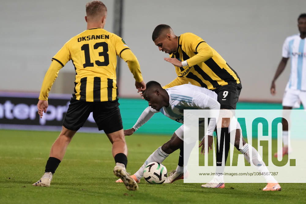 Ahmed Ankrah of Riga FC and Edmilson of Kairat compete for the ball during a UEFA Conference League soccer match between Latvias Riga FC and Kazakhstans Kairat Almaty at Skonto Stadium in Riga, Latvia, Thursday, Oct. 15, 2026. Riga Latvia