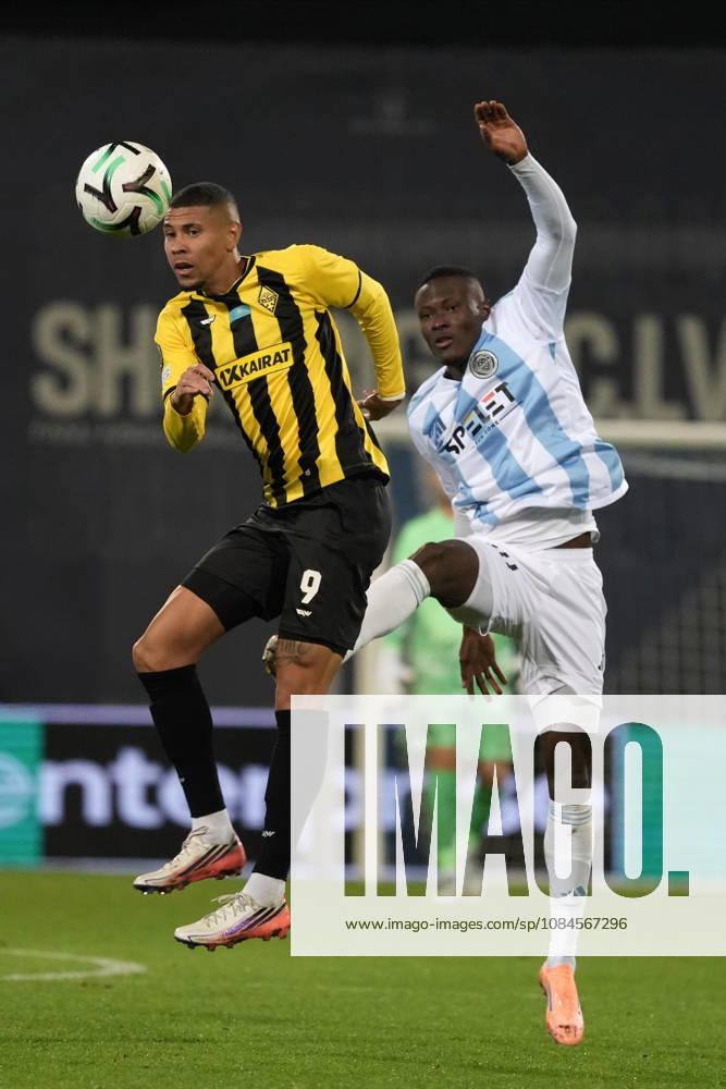 Ahmed Ankrah of Riga FC and Edmilson of Kairat compete for the ball during a UEFA Conference League soccer match between Latvias Riga FC and Kazakhstans Kairat Almaty at Skonto Stadium in Riga, Latvia, Thursday, Oct. 15, 2026. Riga Latvia